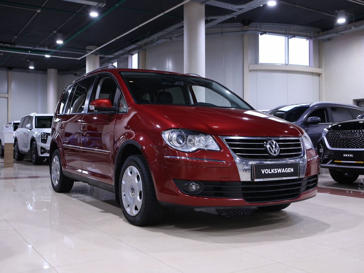 Купить Touran с пробегом